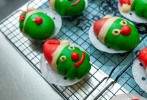 Green steamed buns with Christmas hats