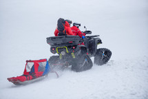The Mountain Rescue Team Save a Person in the Mountains During Winter,