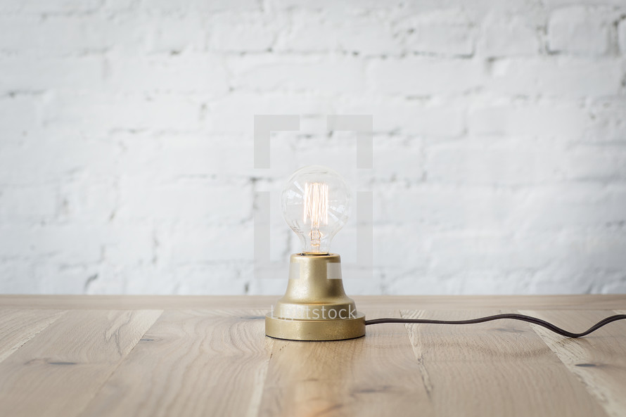 lightbulb on a desk 