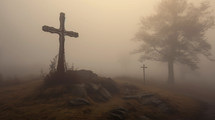 Wooden cross into the fog