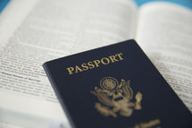 a Passport on a Bible 