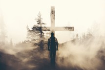 Silhouette of a man on a cross in the forest.