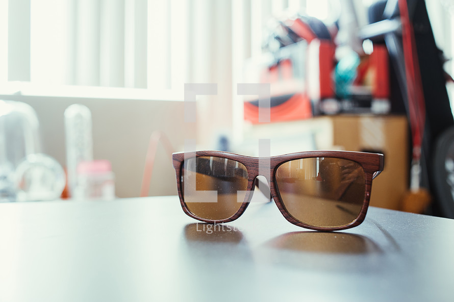sunglasses on a table 