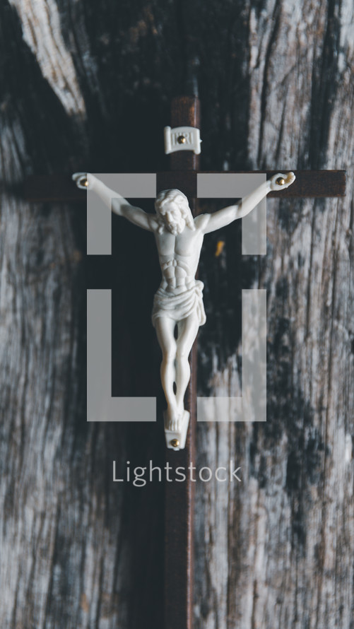 Crucifix on a wooden table