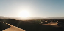 sunset over desert sands 