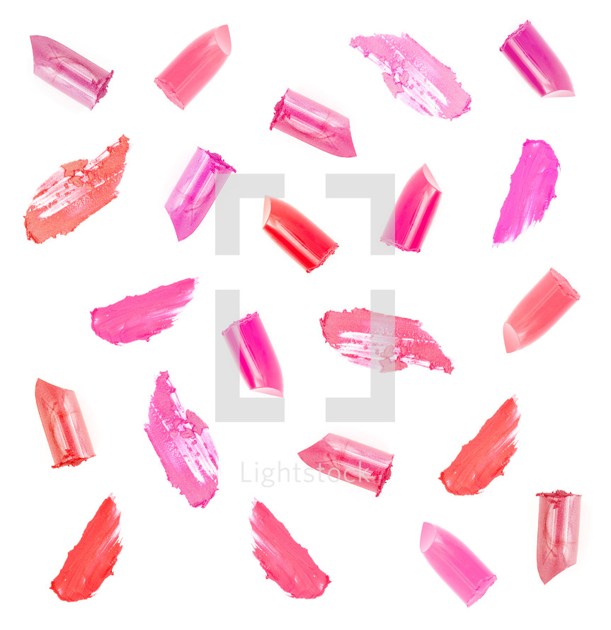 lipstick smears and Cut Lipsticks on a White Background