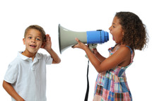 sister yelling at her brother with a megaphone 