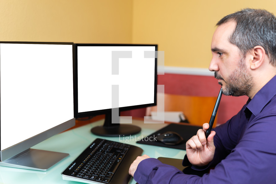 Man thinking on front of computer. Man Teleworking