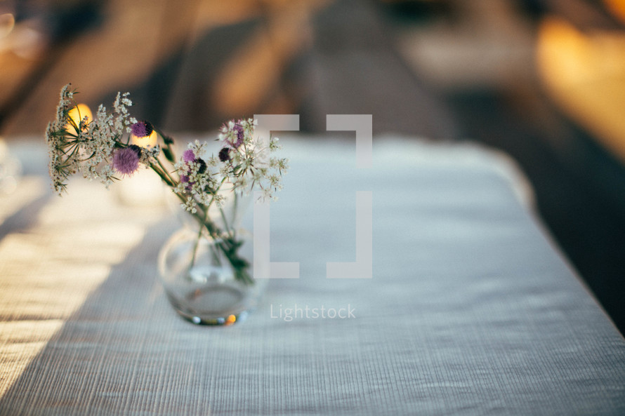 flowers in a vase on a table 