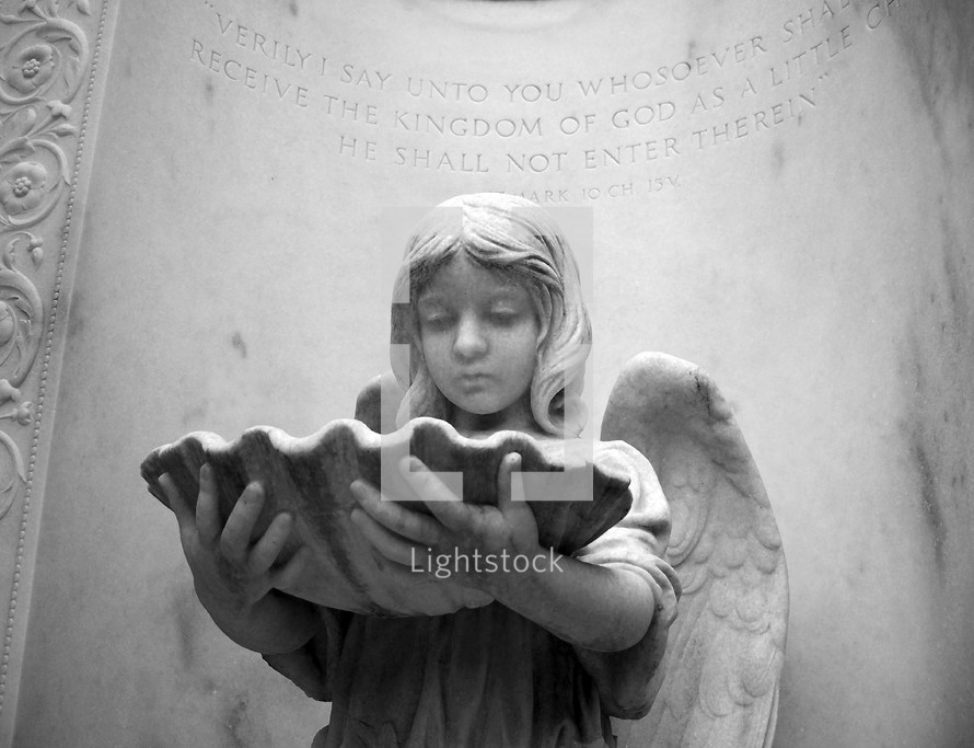 angel statue with bird bath 