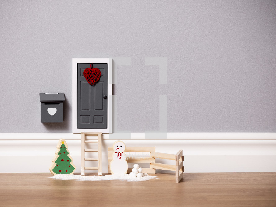 Miniature Christmas Doorway by floor