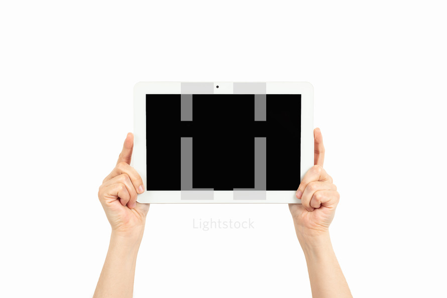 woman hands holding a tablet on a white background
