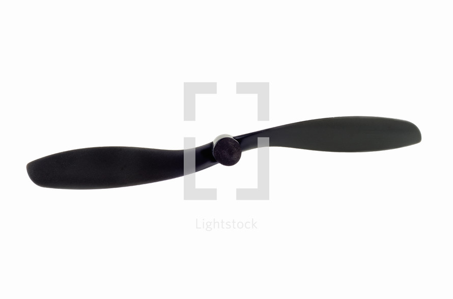 Close up view of a black  propeller isolated on white background. Drone propeller