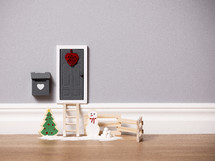 Miniature Christmas Doorway by floor