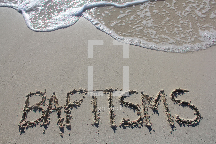Word 'Baptisms' written in the sand 