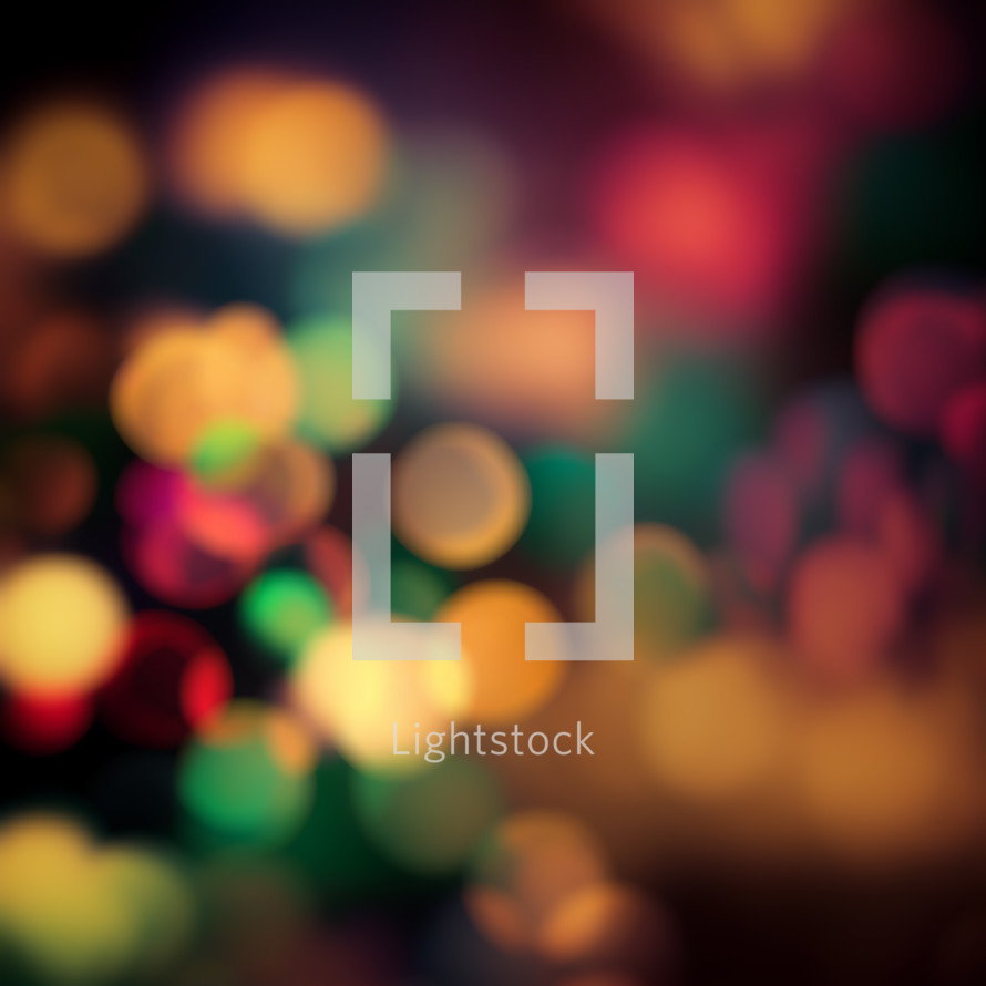 A colorful shot of lights out of focus creating a bokeh pattern