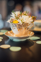 flowers in a tea cup 