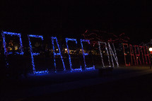 Peace on Earth displayed in Christmas lights