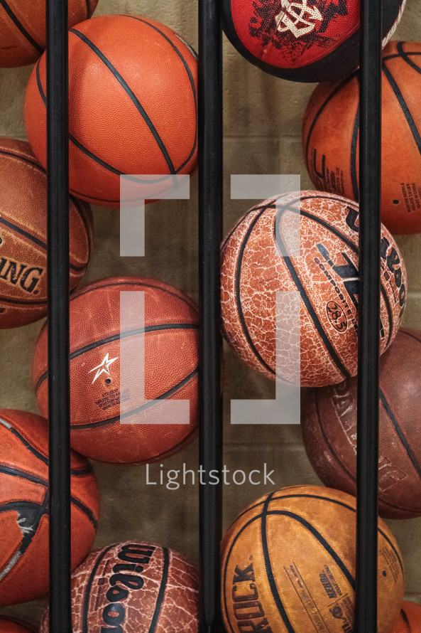basketballs in a basket 