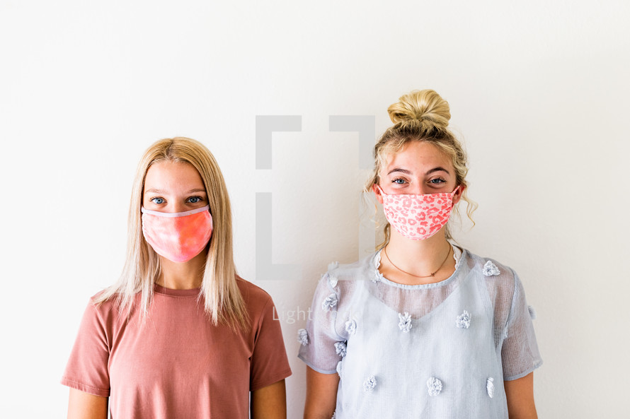 teen girls in face masks 