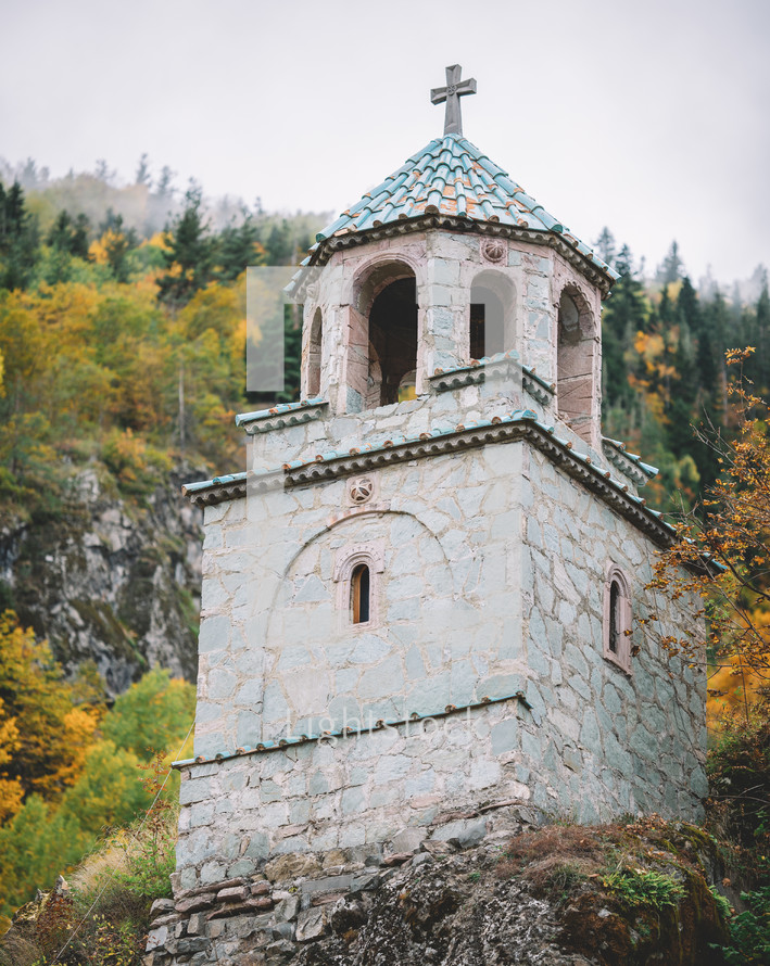 Church in the autumn forest