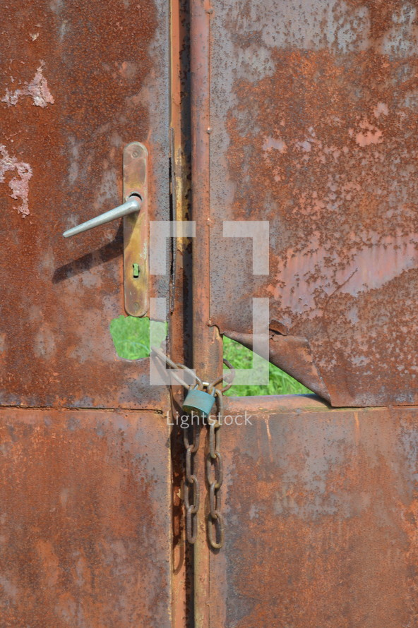 lock on a rusty door 