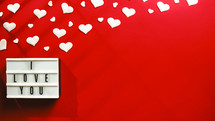 Red background with white heart symbol for valentines day copy space