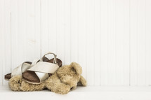 child's sandals and lost teddy bear