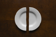 broken plate on a wood background 