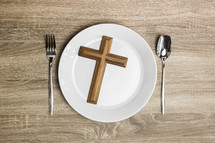 cross, plate, and silverware 