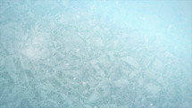 white ice Christmas loop background with sparkles 