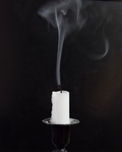 Smoke from a candle right after being blown out