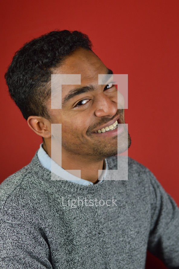 head shot of a smiling man 