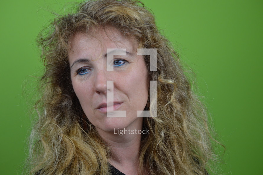 headshot of a middle aged woman in studio 