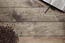 coffee beans and an opened Bible 