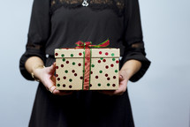 woman holding a Christmas gift 