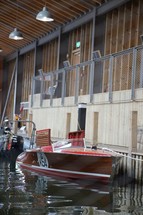 Wooden boat on the water in inside dock