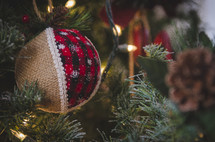 burlap and plaid Christmas ornament on a Christmas tree