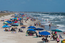Sunbathers and vacationers on Ocean Isle Beach, North Carolina
