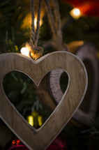 wooden heart Christmas ornaments on a Christmas tree
