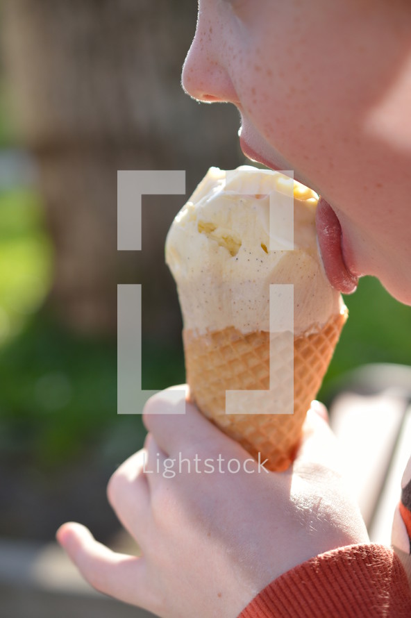 summertime - yummy ice-cream-time!
child licking yummy ice cream in a cone