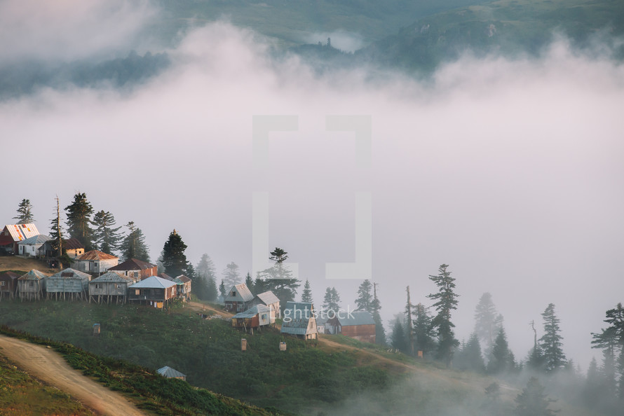 Foggy summer in the mountain village