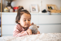 toddler girl praying bedside 