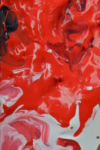 red and white paint on canvas 