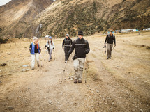 hikers with hiking sticks 
