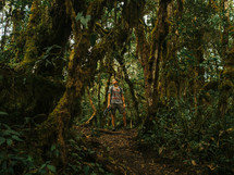 man standing in a jungle 