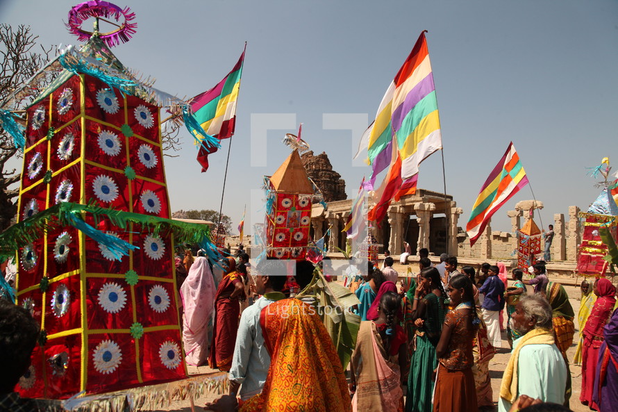 festival, outdoors, India, leaves, flags, man, woman, desert 