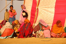 sitting, desert, women, sand, orange, traditional clothing, refugees