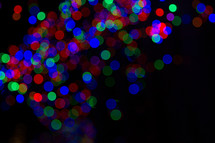 colorful bokeh Christmas lights at night 