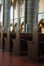 rows of pews in a church 